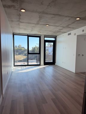 2 BED/2 BATH IN MISSION HILLS! 1/2 OFF FIRST MONTH'S RENT! PARKING, LAUNDRY IN-UNIT, CENTRAL AC, BALCONY, PETS WELCOME! – photo 1