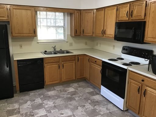2 Bedroom/1.5 Bath Townhome w/ a 1 Car Attached Garage and a Unfinished Basement. – photo 1