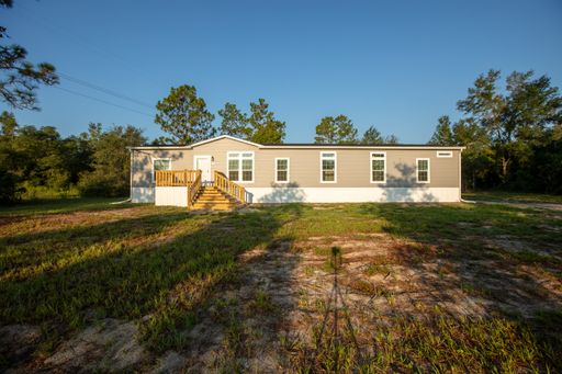Enjoy 2.89 Acres with lots a room to roam!
