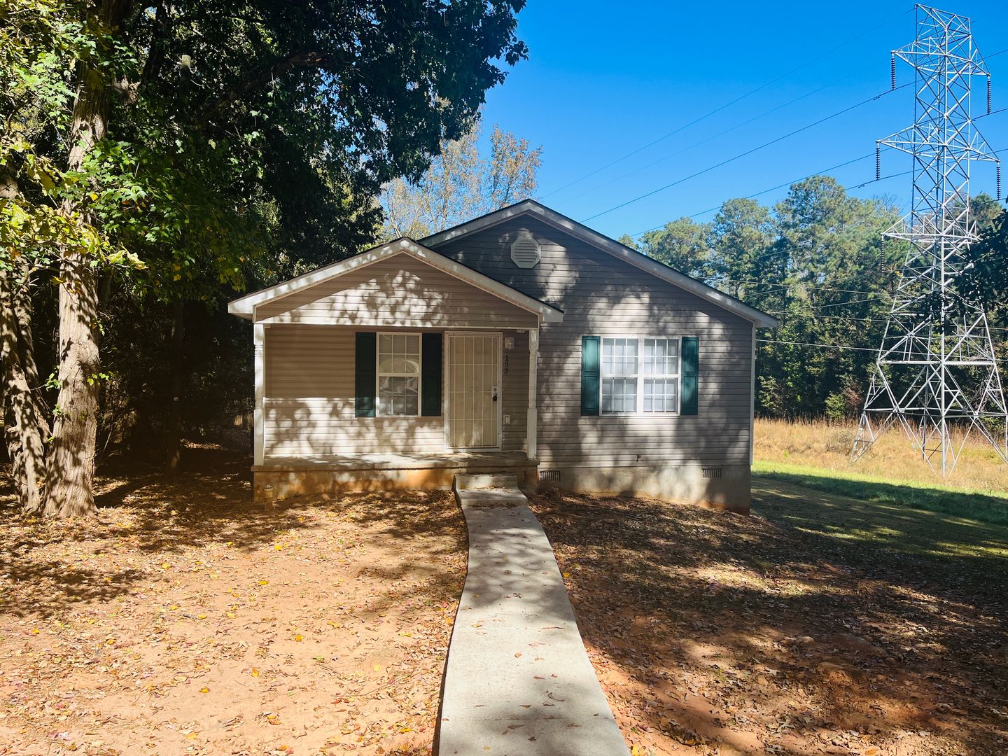 Welcome home! 3 bed, 2 bath, wooded & private lot, parking for 2 cars, large rooms, LVP flooring, newly renovated, must see!