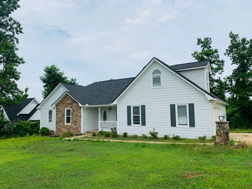 Great location, private/wooded lot, large deck, 4th bedroom up w/attic storage, 2 car garage, fully renovated, must see! – photo 1