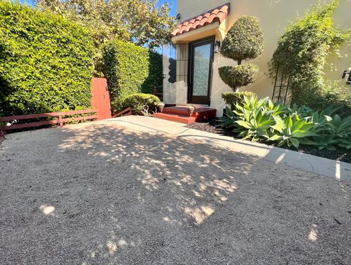 Charming Updated 1920's w/ PRIVATE YARD in small lush triplex compound! – photo 1