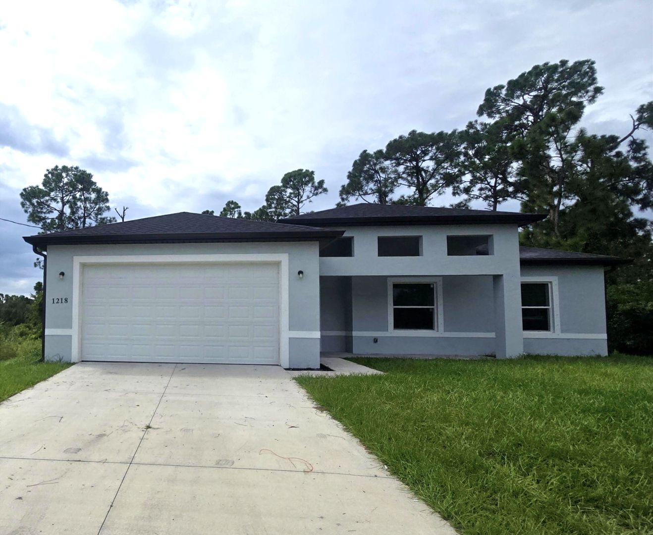 Large 4 Bed 3 Bath with 2 Car Garage-LEHIGH ACRES