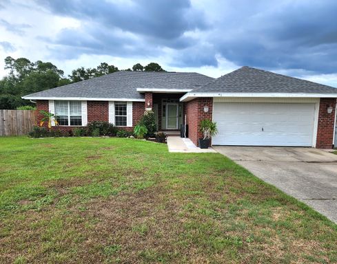 Adorably Styled and Updated 4 bedroom 2 bath Brick home located in Pace Community of La Floresta! – photo 1