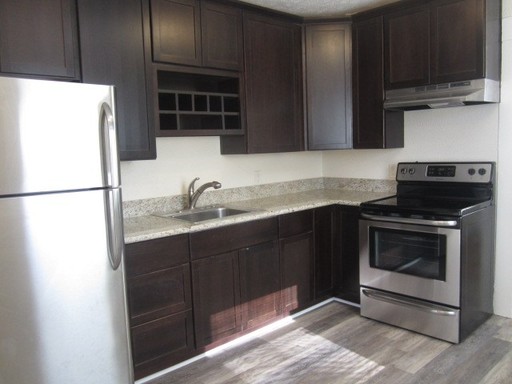 Renovated Brick Building - 1 Bed, 1 Office, 1 Bath with Deck, Storage, Parking and Views of Midtown – photo 1