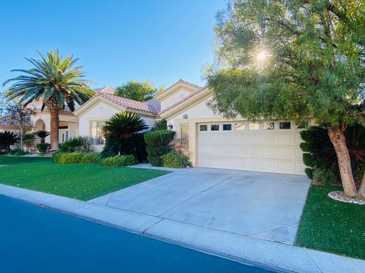 Gorgeous single story property inside Rhodes ranch guard gated community with MAGNIFICENT VIEW of the golf course. Pristine pool and large backyard with gorgeous view of the 9th hole. Tile and hardwood throughout the house. RESIDENT CAN ENJOY THE NUMEROUS – photo 1