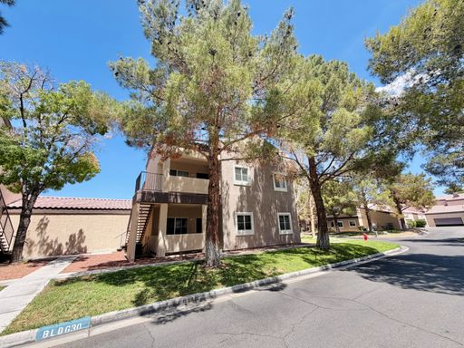 Guard Gated Spanish Palms home with attached 2 car garage! Condo on the second floor with three bedrooms! Spacious living room with separate dining area! Tile and LVP throughout! Community features include pool, clubhouse, exercise room, playgrounds, etc. – photo 1