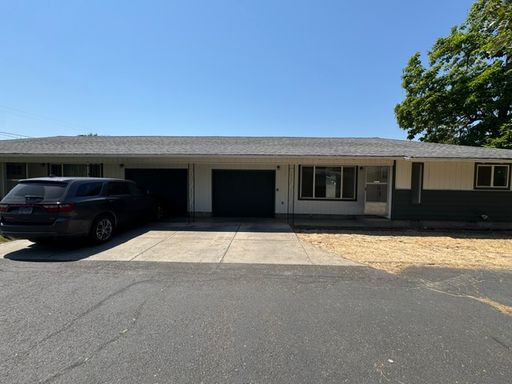 Beautifully Updated Eagle Point Home with New LVP Flooring, Fenced Yard & Double Garage