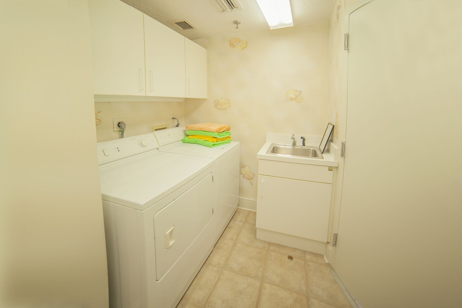 Laundry room at 3040 Grand Bay Blvd Unit 292