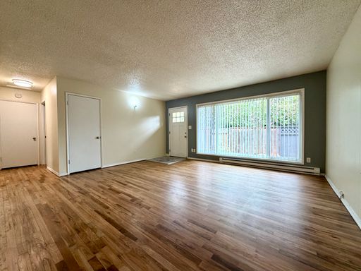 Updated Two Bedroom in Reed Neighborhood w/ Private Fenced Front Patio~ Onsite Laundry~ Off Street parking~ Pets Welcome – photo 1