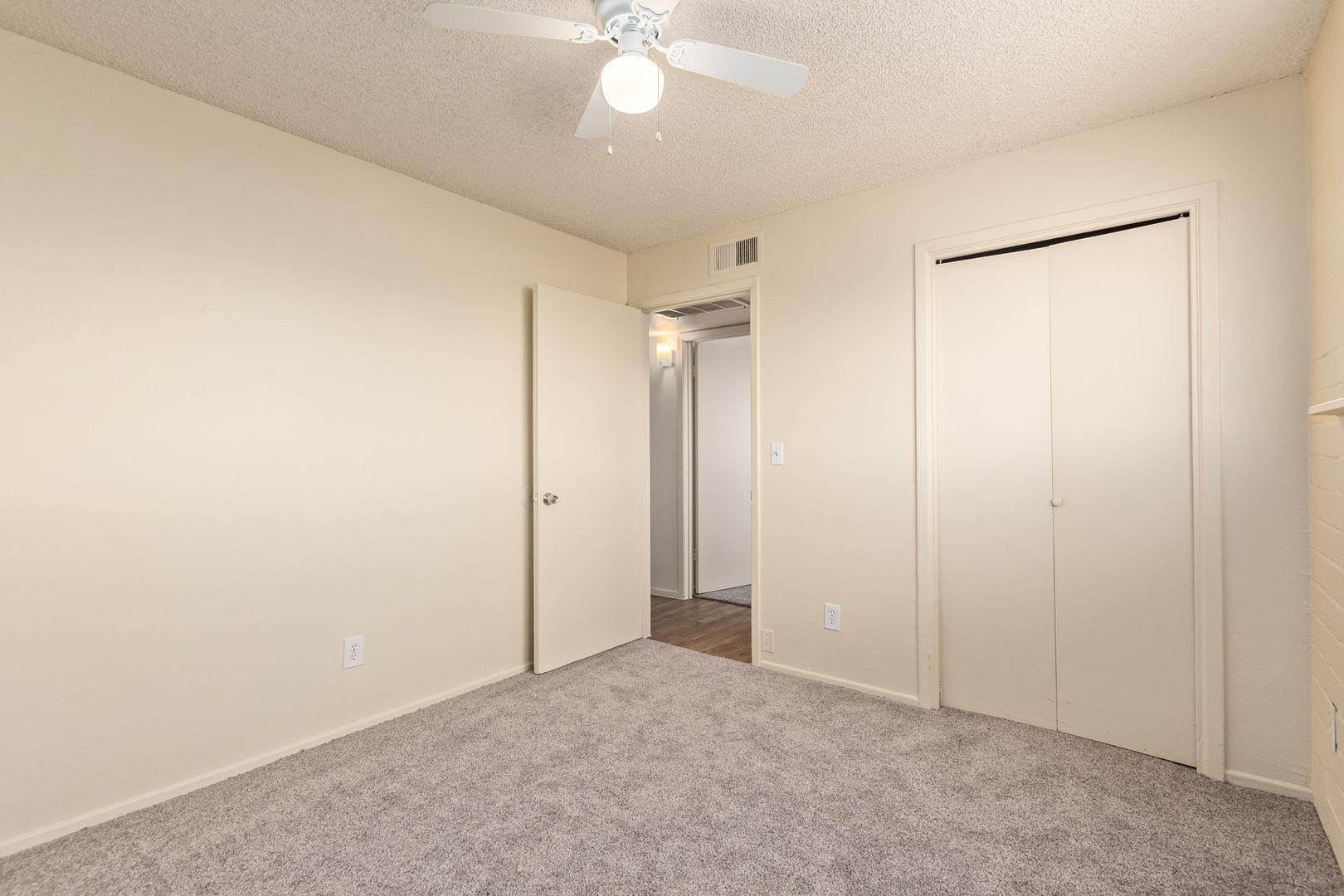 Unfurnished bedroom — representative home at Earll Drive Apartments.