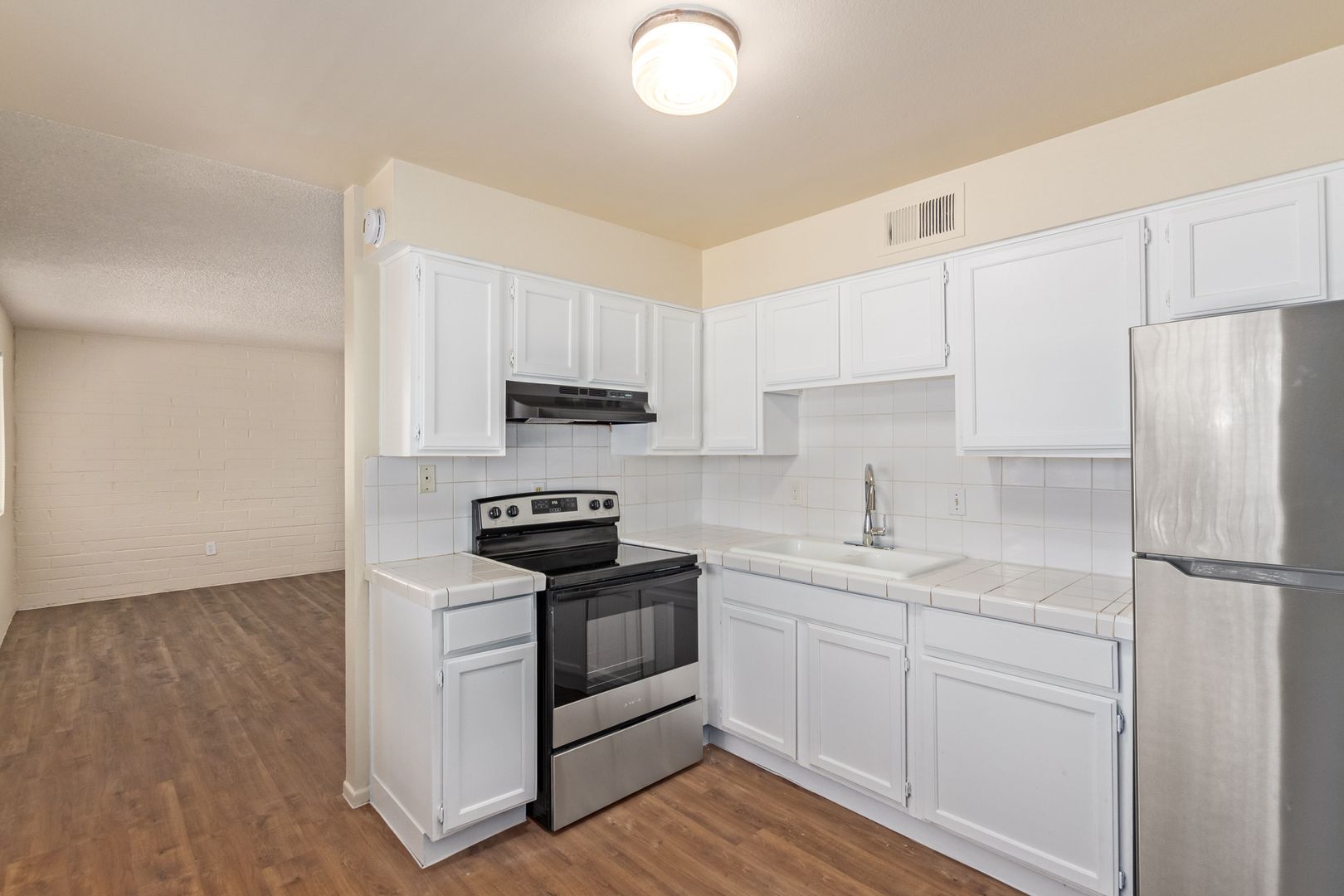 Apartment kitchen — representative home at Earll Drive Apartments.