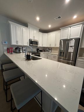 Modern 3BR Condo: Walk to Metro, 3 Miles from IAD – photo 1