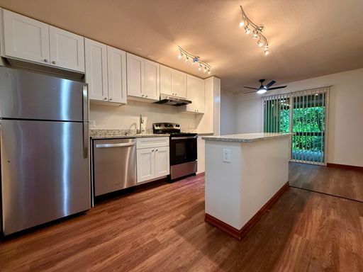 GORGEOUS! Renovated Upper-Level in Forest-Like Setting! – photo 1