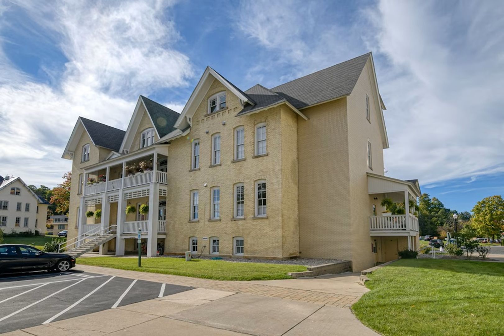 Historic Top Floor Condo For Rent at The Lovely Grand Traverse Commons! Available Off-Seasons: Sept 2024 Thru May 2025