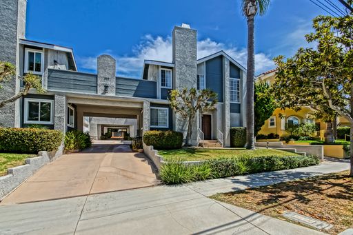 Remodeled, Bright & Airy, 2-Story Front Townhouse w/ Dual Primary Suite Layout, Bright & Open Living Space w/ Ocean Peek & 2-Car Garage Close to Schools, Shopping & Just 2 Mins to Beach! – photo 1