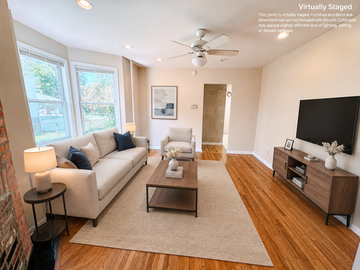 3BR/1BA Home with Spacious Rear Deck, Shared Basement Laundry & Driveway Parking