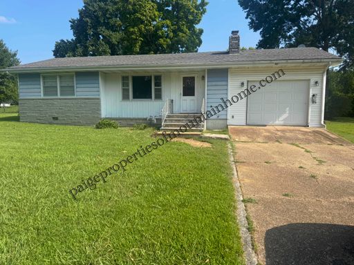 Charming 2-Bedroom Home with Large Yard & Garage