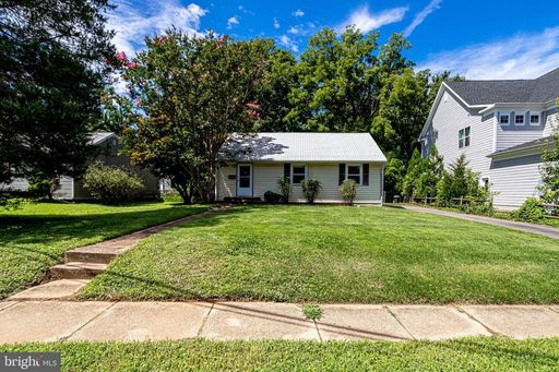 Discover the charm of this beautifully expanded classic rambler offering more than 1,200 square feet of comfortable living space in a highly desirable Inside the Beltway location. – photo 1