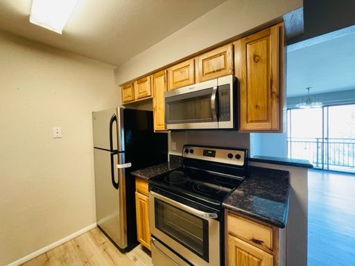 Updated Condo with Modern Finishes and Private Patio - UTILITIES INCLUDED!!! – photo 1