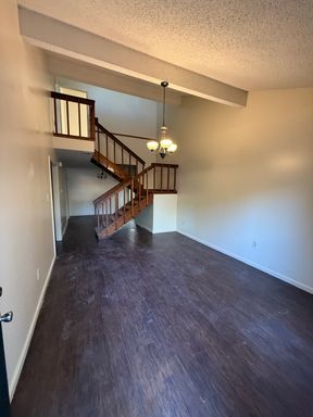 Beautiful and spacious townhome with cathedral ceilings. Ready for you to make it home. – photo 1