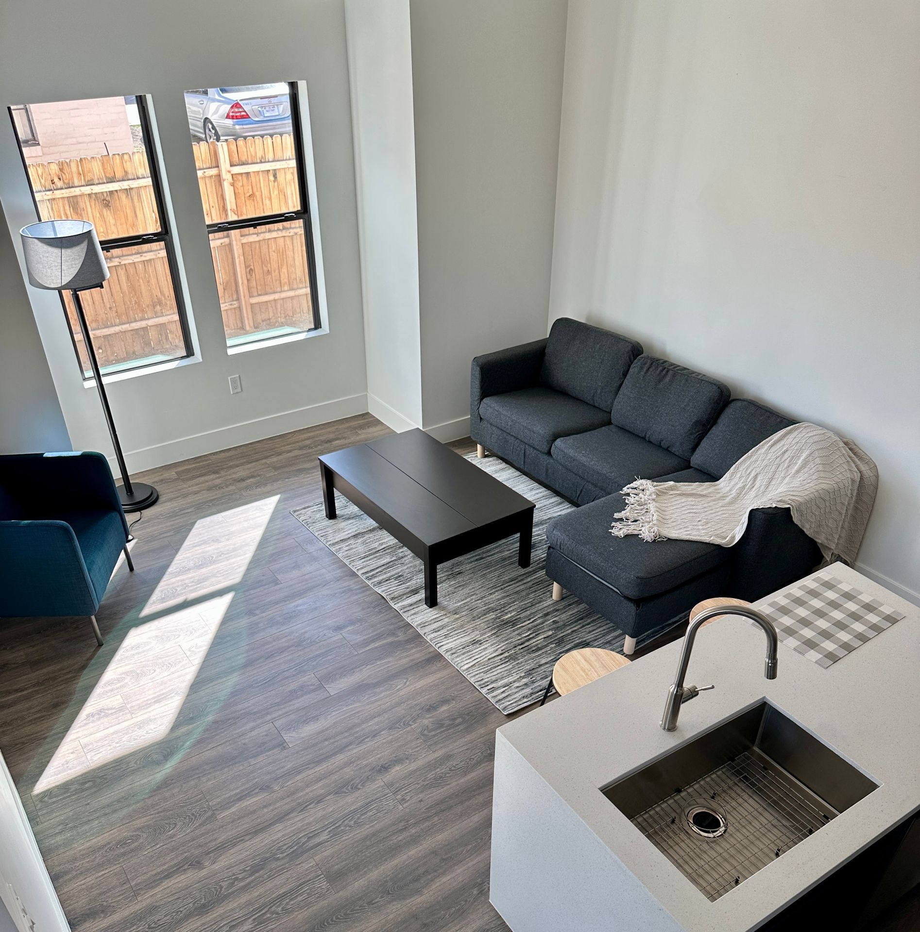 Furnished apartment living area shown at 326 North 17th Drive.