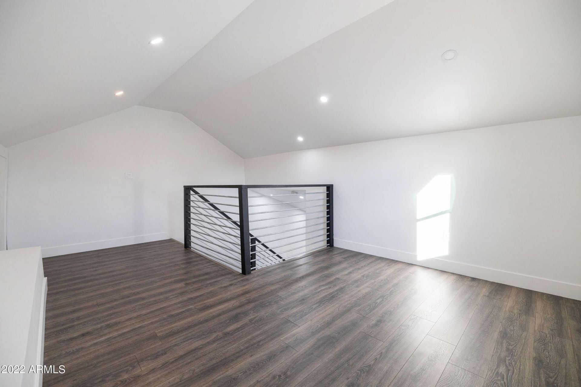 Unfurnished loft in the home shown at 326 North 17th Drive.