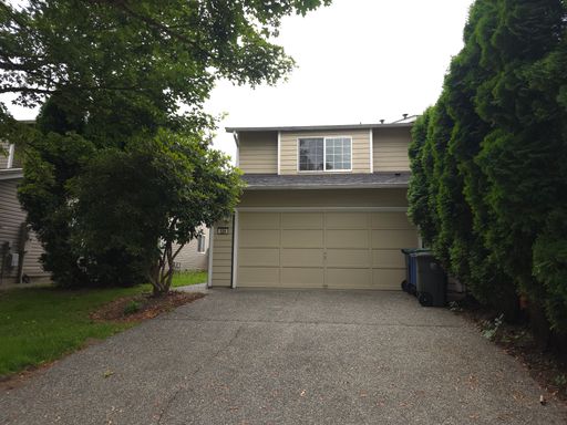 Spacious 3-Bedroom, 2-Bath Townhouse with Private Yard & 2-Car Garage