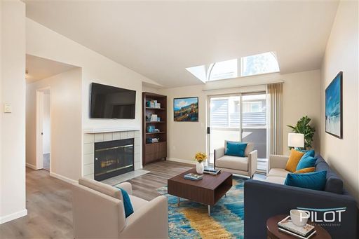 2 Weeks Free! Bright & Spacious with Vaulted Ceiling and Fireplace! – photo 1