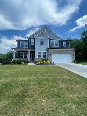 Exquisite 4 bedroom home on full basement in highly sought after Forsyth county neighborhood by Platinum Property Management Services, Inc. – photo 1