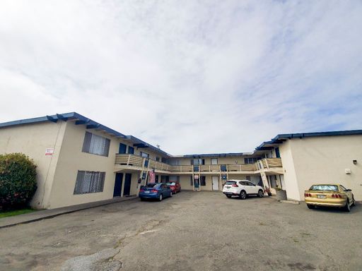 This upstairs apartment is centrally located near shopping, a bus stop, and restaurants! – photo 1