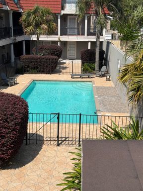 Lakefront Living: Stylish 2BR Condo with 1.5 Baths & Scenic Water View – photo 1