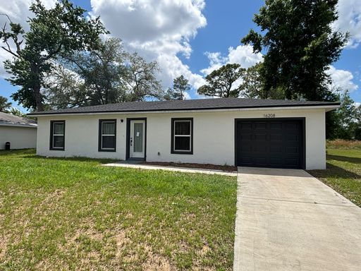 LIKE NEW DESIGNER HOME 3/2 READY FOR NEW FAMILY – photo 1
