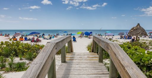 ** 3/2 VANDERBILT VILLAS CONDO UPDATED ** ANNUAL OR SEASONAL ** WEEKLY 7 DAY MINIMUM STAY REQUIRED ** HEART OF NAPLES ** COMMUNITY SWIMMING POOL ** WEEKLY UNIT ** – photo 1