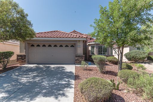Single story home located in Aliante with 3 bedrooms plus a den! – photo 1
