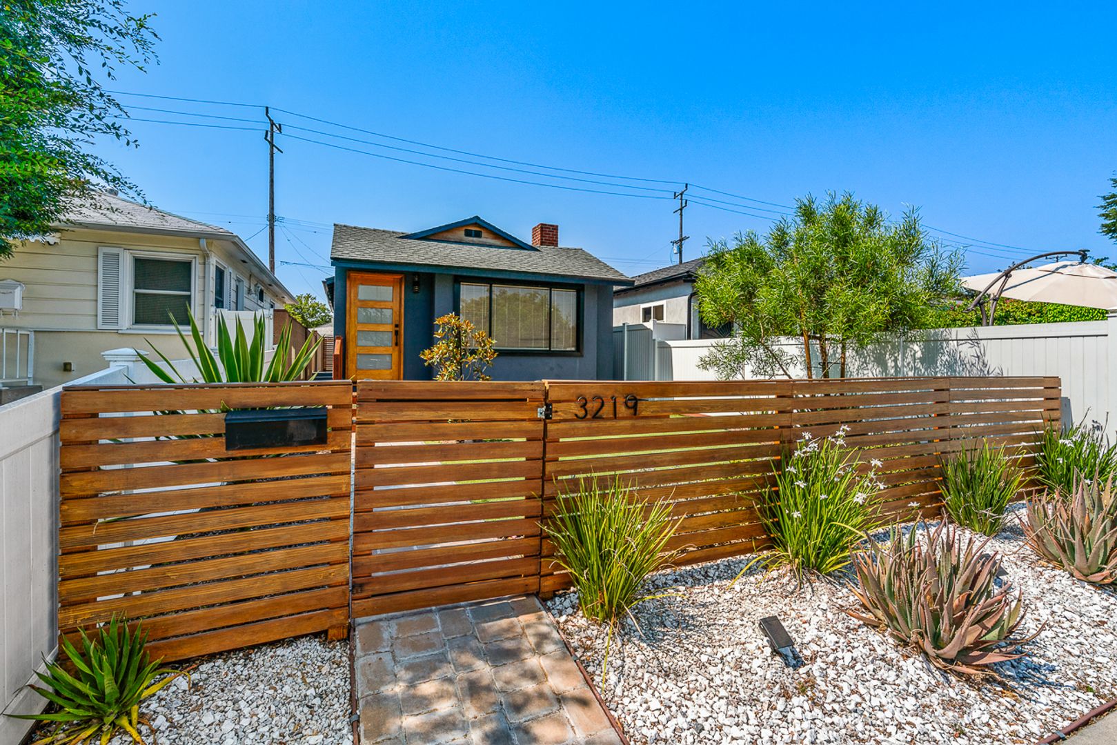 Move-in ready Magnolia Park gem — modern finishes, private front deck, & converted garage studio!