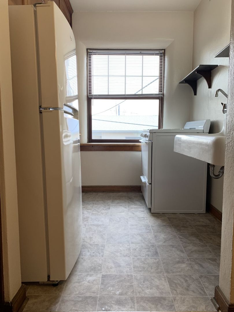 Laundry room at Charming apartment Hamline-Midway