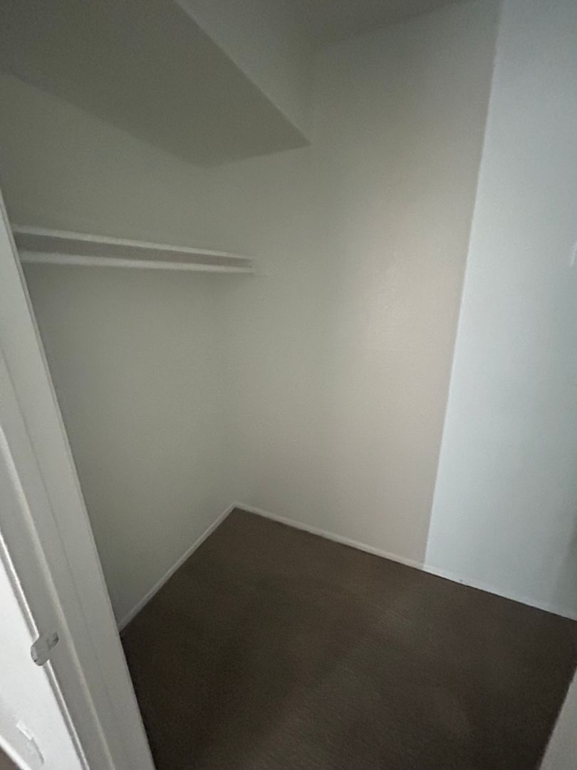 Closet storage — representative home at San Marina Apartments.