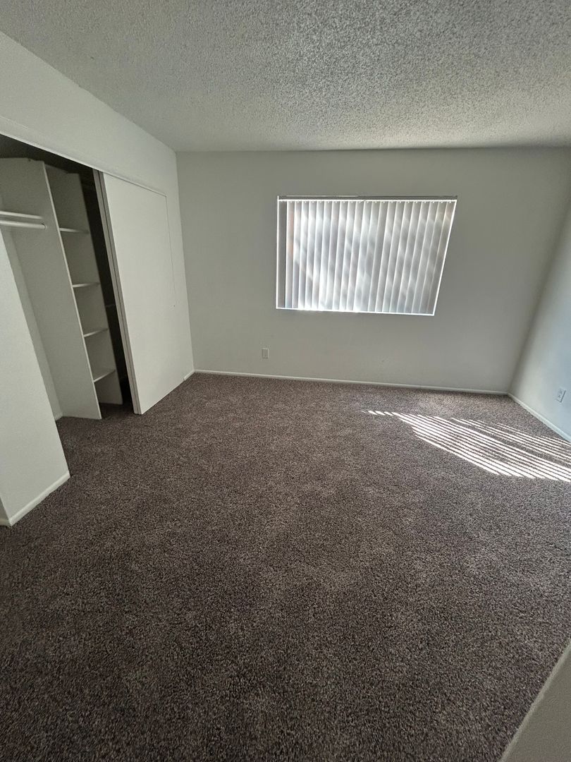 Unfurnished bedroom — representative home at San Marina Apartments.