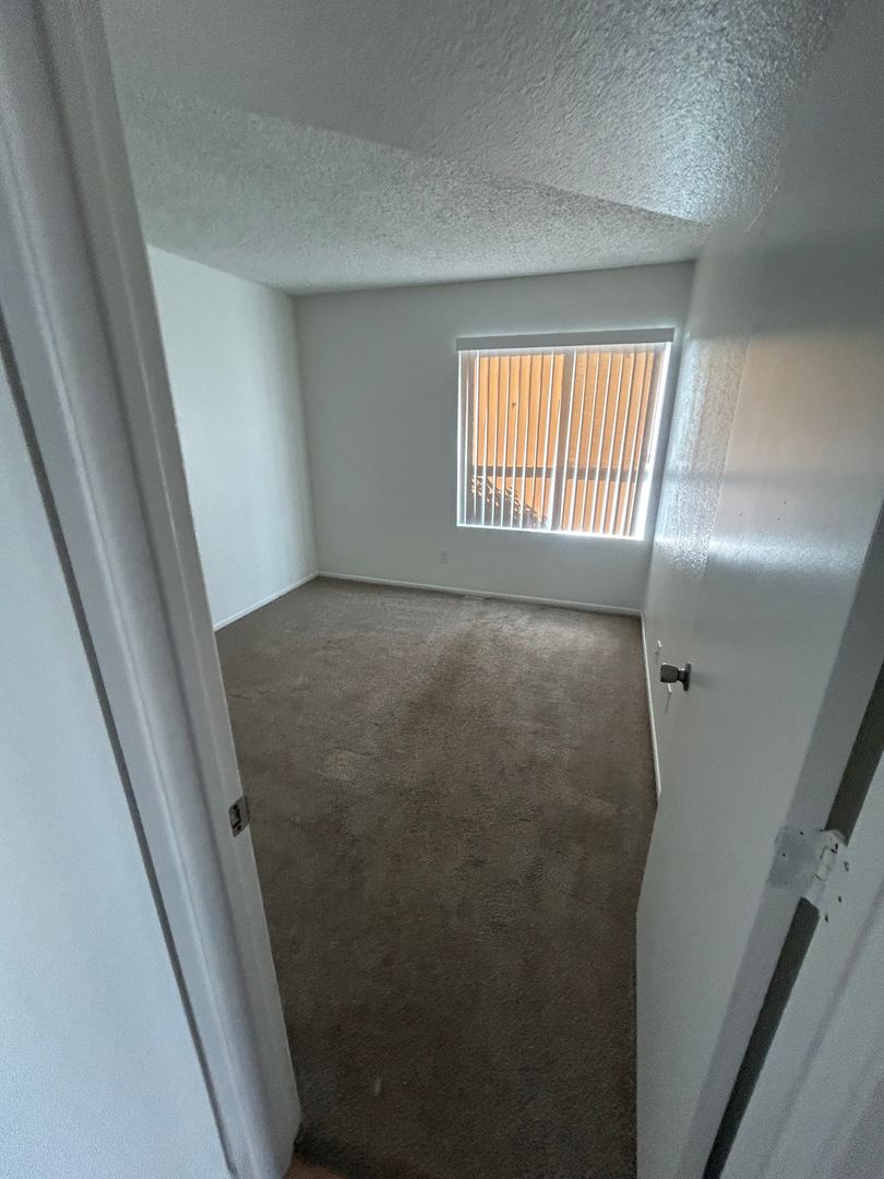 Unfurnished bedroom — representative home at San Marina Apartments.