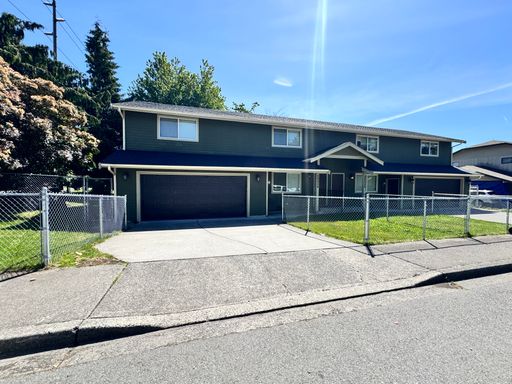 Updated 4 Bedroom/2 Bath Duplex - Fenced Yard, 2 Car Garage, Granite Counters, W/D, NEW PAINT/CARPET! – photo 1