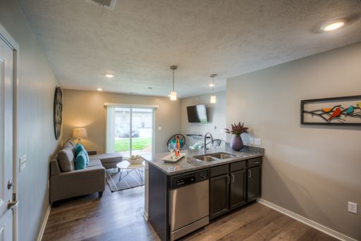 Enjoy this furnished corporate unit open floor plan with world-class amenities like stainless steel appliances and in-unit washer and dryer. – photo 1