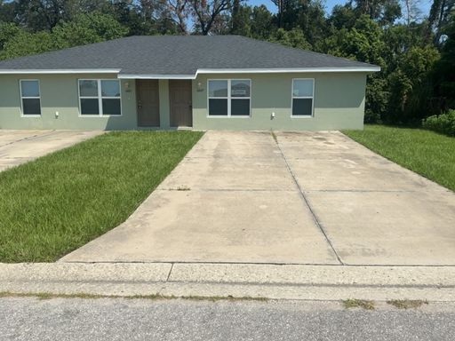 Move-In Ready! Open-Concept 2BR/2BA Duplex with In-Unit Laundry Hookups – photo 1
