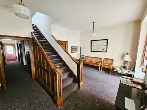 2nd floor private office space in shared office building. Built in storage cabinets in unit. All utilities included