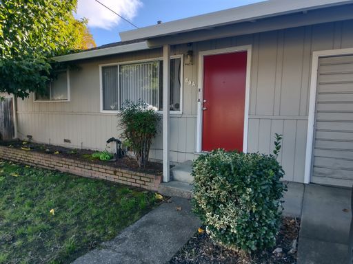 PURE Property Management Presents: 2 Bedroom House (Duplex Style) with Yard and Garage! – photo 1