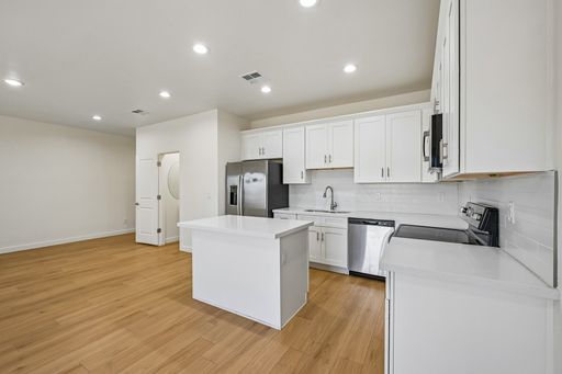 Elevate Your Lifestyle in This Stunning 4BR Townhome – photo 1