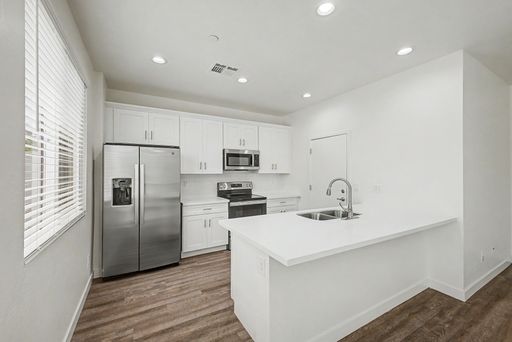 Private Desert Retreat | 3 Bed Townhome with Garage & Backyard – photo 1