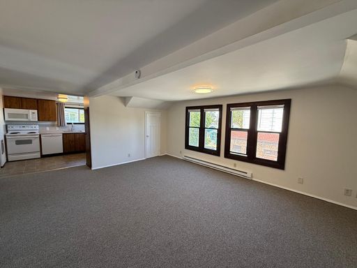 Top Floor Greenwood 2BR Apartment | Parking Included | Pets Welcome – photo 1