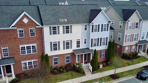 Walk to Bonefish & Target from this like new multi-level 4 bedroom, 3.5 bath townhome! – photo 1