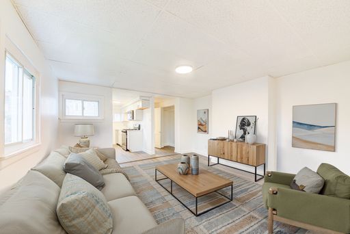 AVAILABLE NOW - 4 Bedroom Renovated Unit in the Heart of the Business District! – photo 1